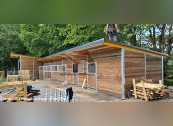 Buy an outdoor stable – construct a horse barn with ideal stables and an open stall for horses