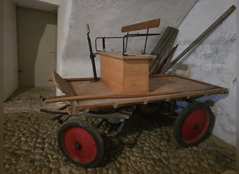 Four-wheeled horse-drawn carriage / work cart made of wood
