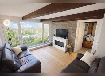 Completely renovated former farm with 3 hectares of private land, riding arena, and indoor riding ha