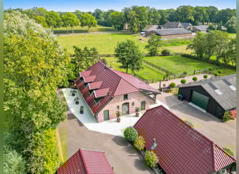 Country estate with equestrian facilities including an indoor riding arena, outdoor riding arena, an