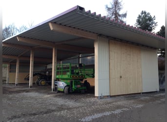 Equestrian facility with approximately 45 acres of private land, extensive riding arena, and multipl