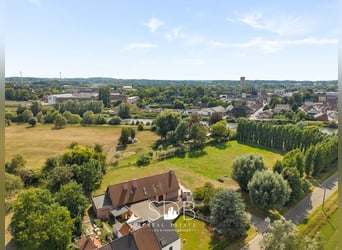 Hedendaagse villa met gezinstuin en graslanden op 7.496m2 te Heusden | België