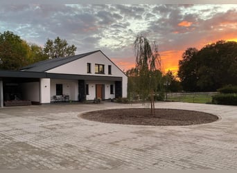 Private riding facility – recently renovated, including an indoor arena, large outdoor sand school, 