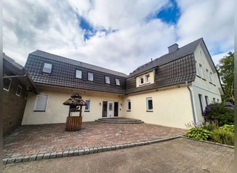 Versatile equestrian facility with a spacious two-family house in Hude (Oldenburg district)