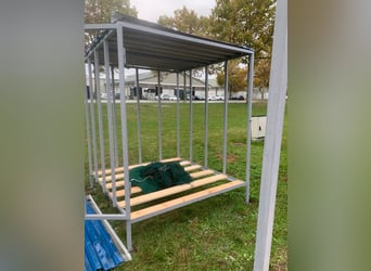 Mangime per balle di fieno a forma di rotonda