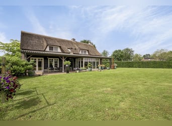 Beautifully finished equestrian property on a unique location with unobstructed view!