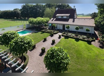 Complete Equestrian Facility with Residence and Extensive Amenities