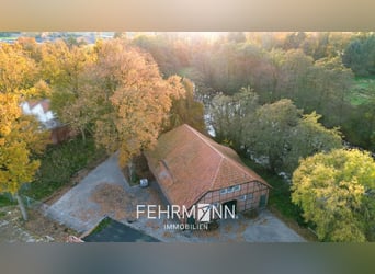 Exclusief landgoed met villa, rijhal en manegecomplex aan een privémeer te koop