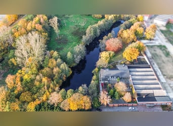 Exclusief landgoed met villa, rijhal en manegecomplex aan een privémeer te koop