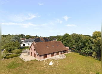 Hedendaagse villa met gezinstuin en graslanden op 7.496m2 te Heusden | België