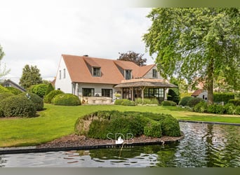 Prachtige landelijke villa met gezinstuin en graslanden op 32.558m² te Lochristi | België