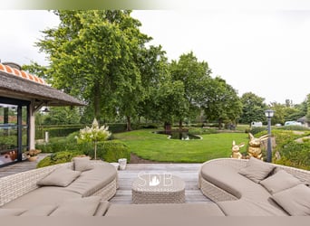 Prachtige landelijke villa met gezinstuin en graslanden op 32.558m² te Lochristi | België