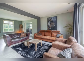 Unique equestrian property with 10 stables & outdoor arena near forest trails