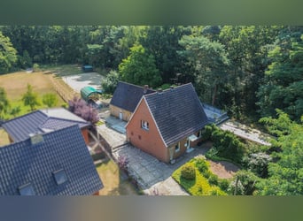 Vrijstaand huis met garage, paardenstal en rijbaan te koop in de Metelener Heide