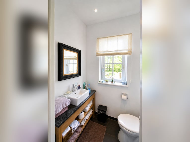 Propriété équestre exclusive avec une maison d'habitation élégante, de vastes pâturages et un centre