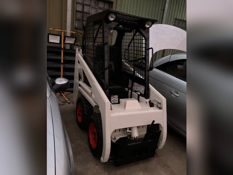 Mini-chargeur sur chenilles à moteur Diesel