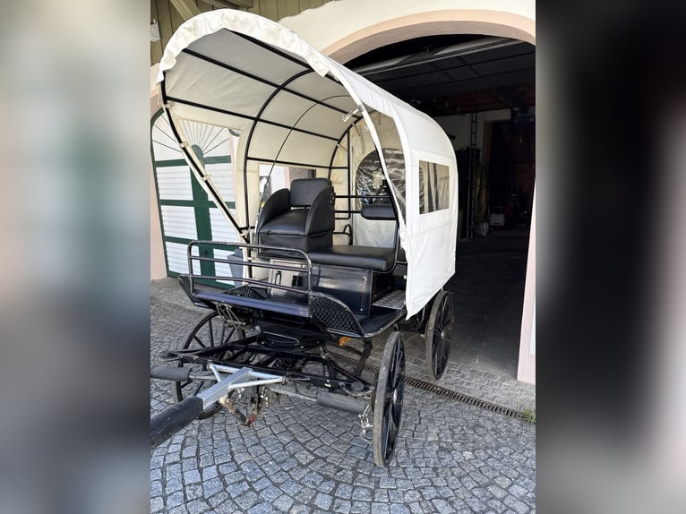 Carro de caballos con freno de disco