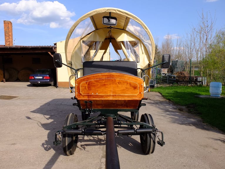 New covered wagon with tractor wheels