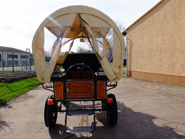 New covered wagon with tractor wheels