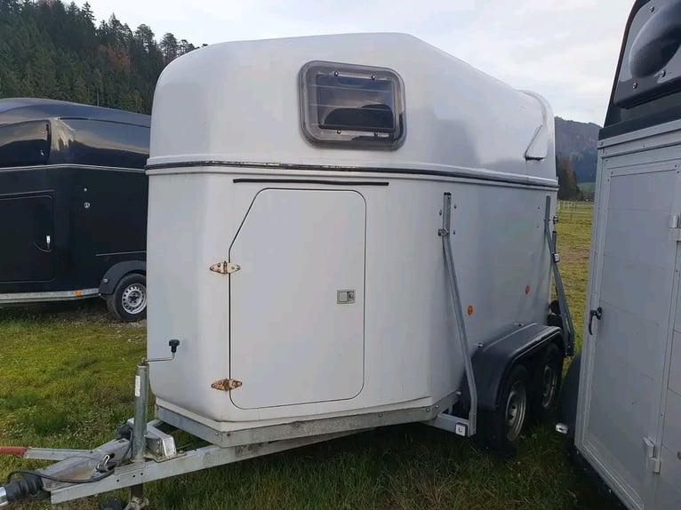 Two-horse trailer by MAN.