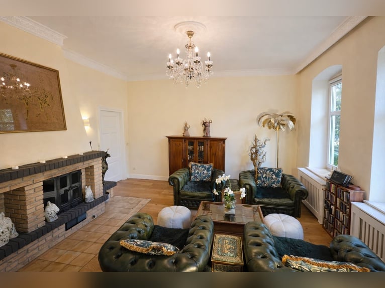 Completely renovated former farm with 3 hectares of private land, riding arena, and indoor riding ha