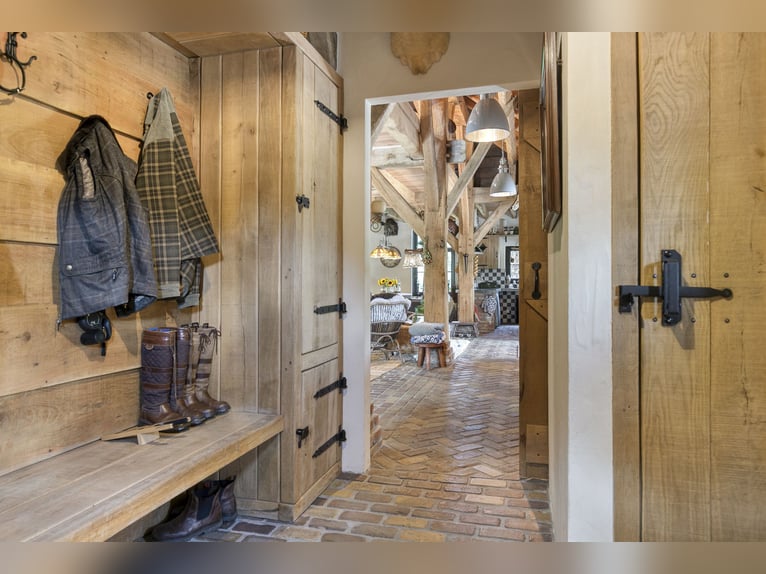 Country estate with equestrian facilities including an indoor riding arena, outdoor riding arena, an