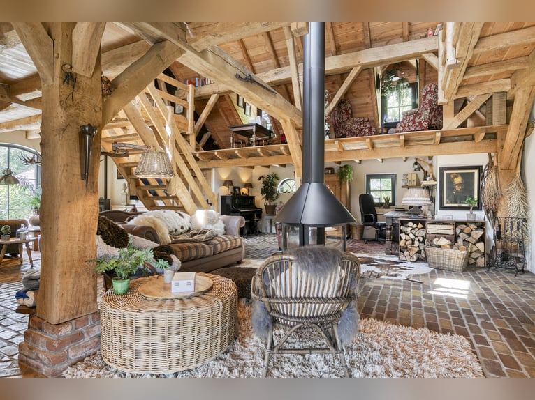 Country estate with equestrian facilities including an indoor riding arena, outdoor riding arena, an