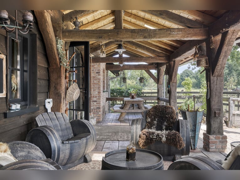 Country estate with equestrian facilities including an indoor riding arena, outdoor riding arena, an