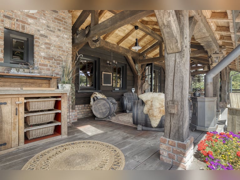 Country estate with equestrian facilities including an indoor riding arena, outdoor riding arena, an