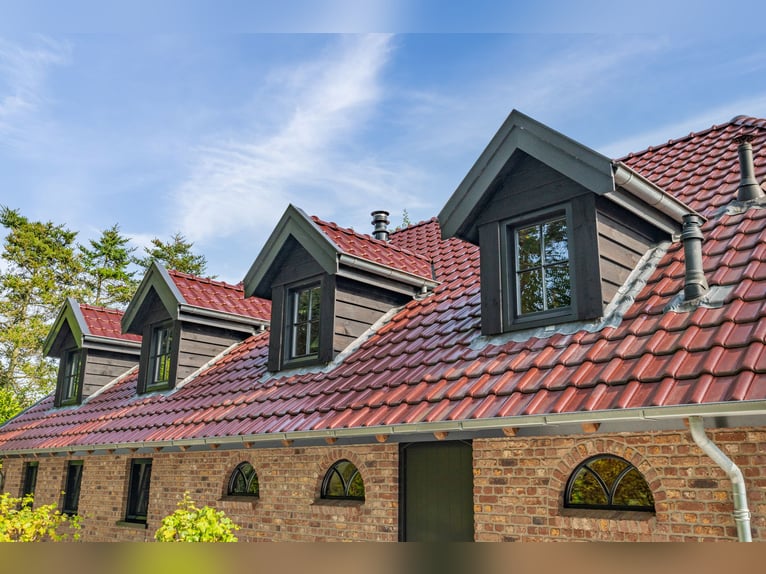 Country estate with equestrian facilities including an indoor riding arena, outdoor riding arena, an