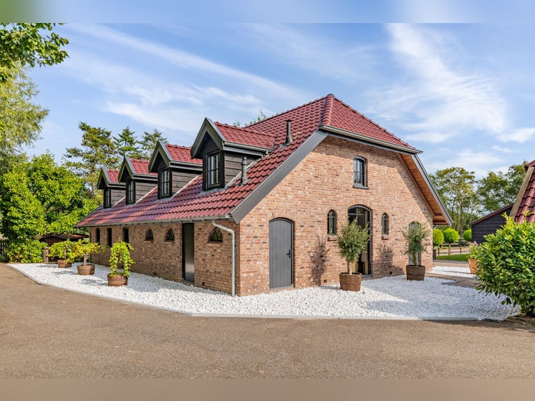 Country estate with equestrian facilities including an indoor riding arena, outdoor riding arena, an