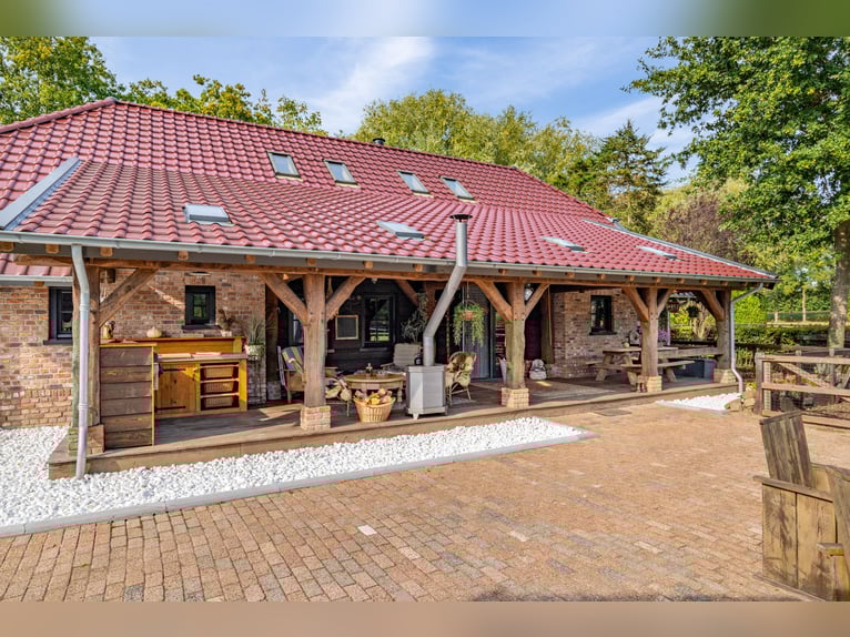 Country estate with equestrian facilities including an indoor riding arena, outdoor riding arena, an