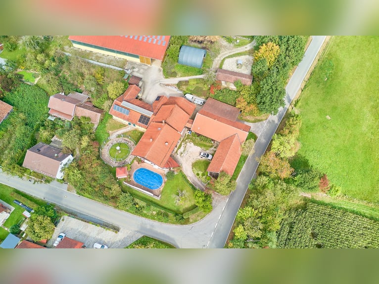 Equestrian farm in Lower Bavaria featuring an indoor riding hall, stylish country house, and heated 