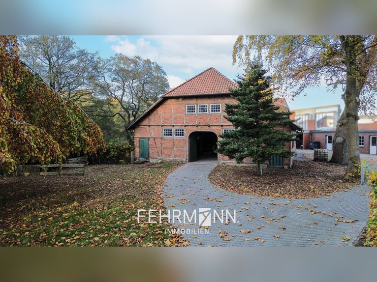 Exclusive estate with a villa, riding facilities, and an indoor arena complex located by a private l