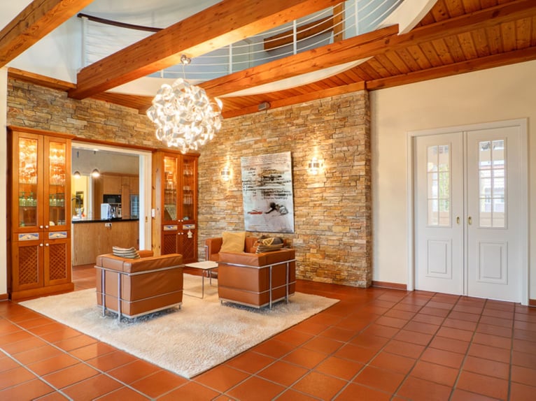 Exclusive estate with approximately 460 sqm of living space, stables, riding arena, outbuildings, an