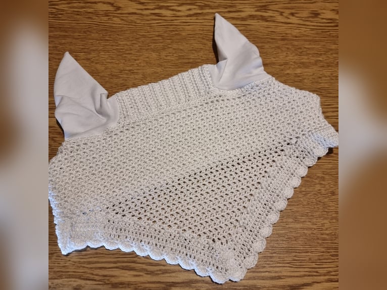 Handgemachte Fliegenhauben