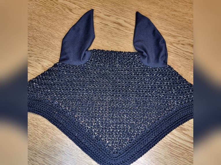 Handgemachte Fliegenhauben