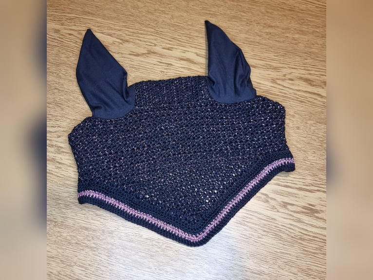 Handgemachte Fliegenhauben