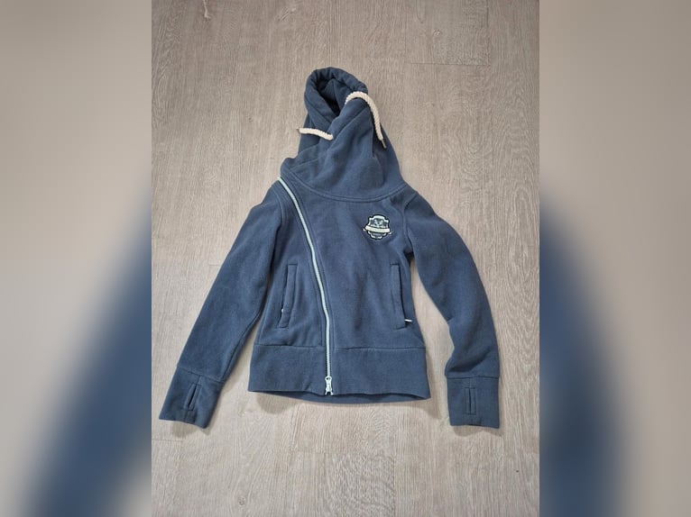Fouganza synthetik Lederchaps