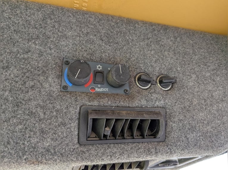 John Deere 110 graafmachine