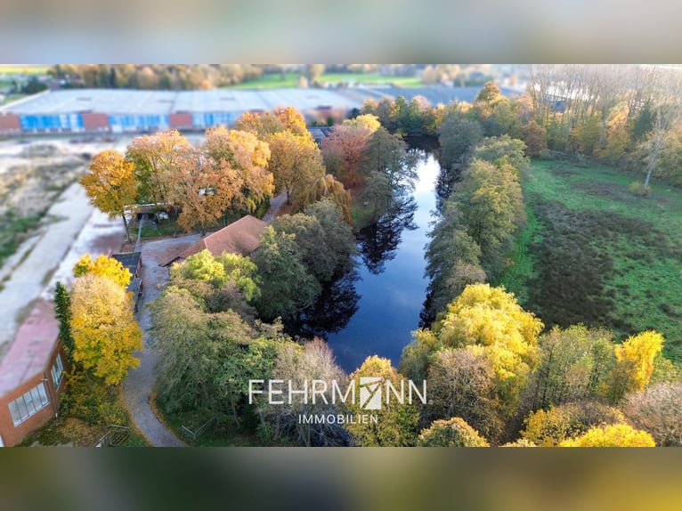 Exclusief landgoed met villa, rijhal en manegecomplex aan een privémeer te koop